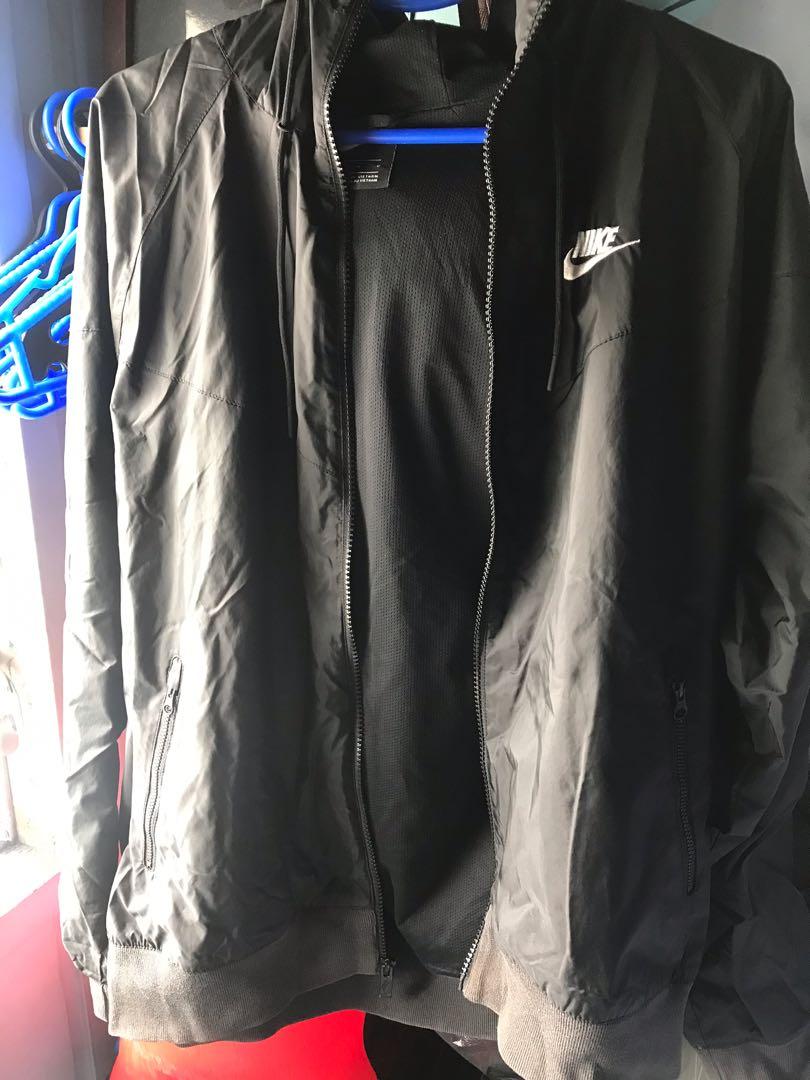 NIKE windbreaker (Category: Coats, Jackets and Outerwear) located in Manila. Submitted by eemjay (Listing ID 1098604121, Image 1). Description: Selling my husband NIKE windbreaker jacket Used but not abuse Rfs: Declutter .