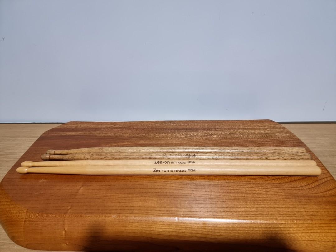 Pearl and Zen-on Drum Sticks (Category: Musical Instruments) located in Binangonan. Submitted by caaaris (Listing ID 1098656422, Image 1). Description: Two pairs of Drum Sticks With handmade pouch for four pairs of drum sticks Pearl Hand Made Still in excellent condition Zen-on 35 A Unused condition In mint condition.