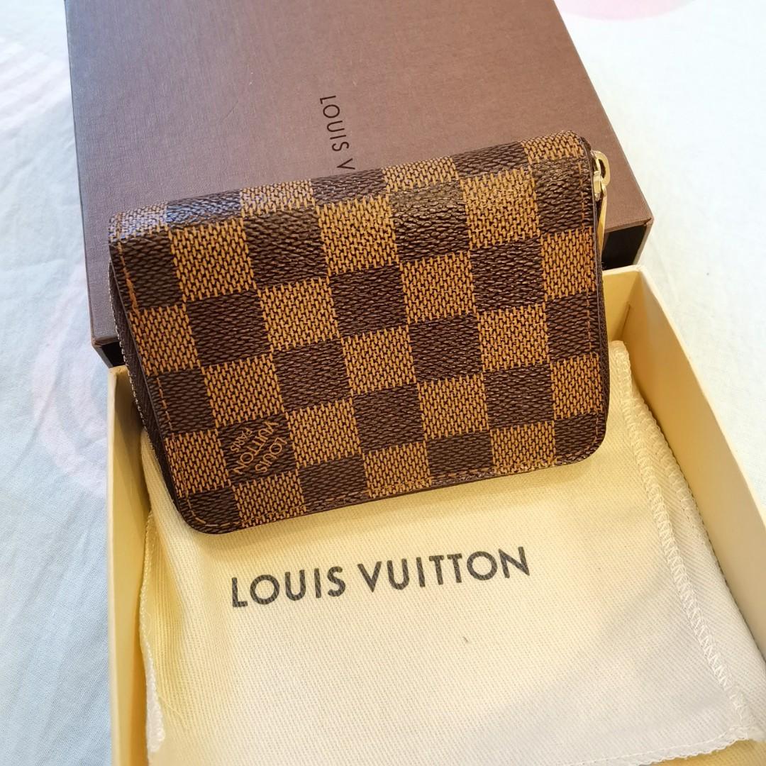 Preloved authentic Louis vuitton Lv damier ebene zippy coin purse