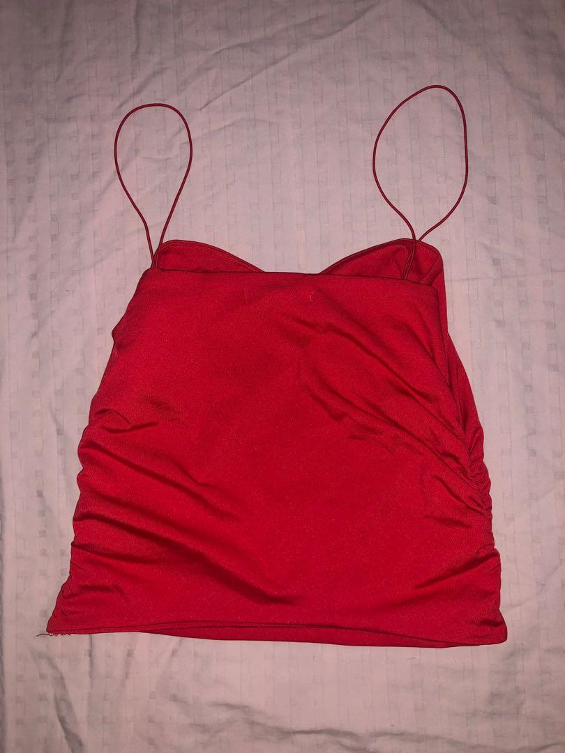 Red Ruched Top (Category: Sleeveless) located in Quezon City. Submitted by as.declutters (Listing ID 1098619593, Image 2). Description: This is a Red Ruched Top. ONLY USED ONCE. 150 + shipping fee (can be arranged by buyer or through Zoom or DPX). Fits size XS-Small. PM me for inquiries/details..
