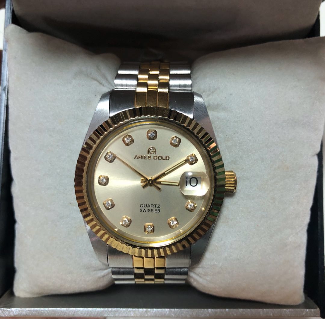 Aries top gold swiss