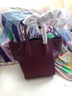 Two-way maroon shoulder leather bag