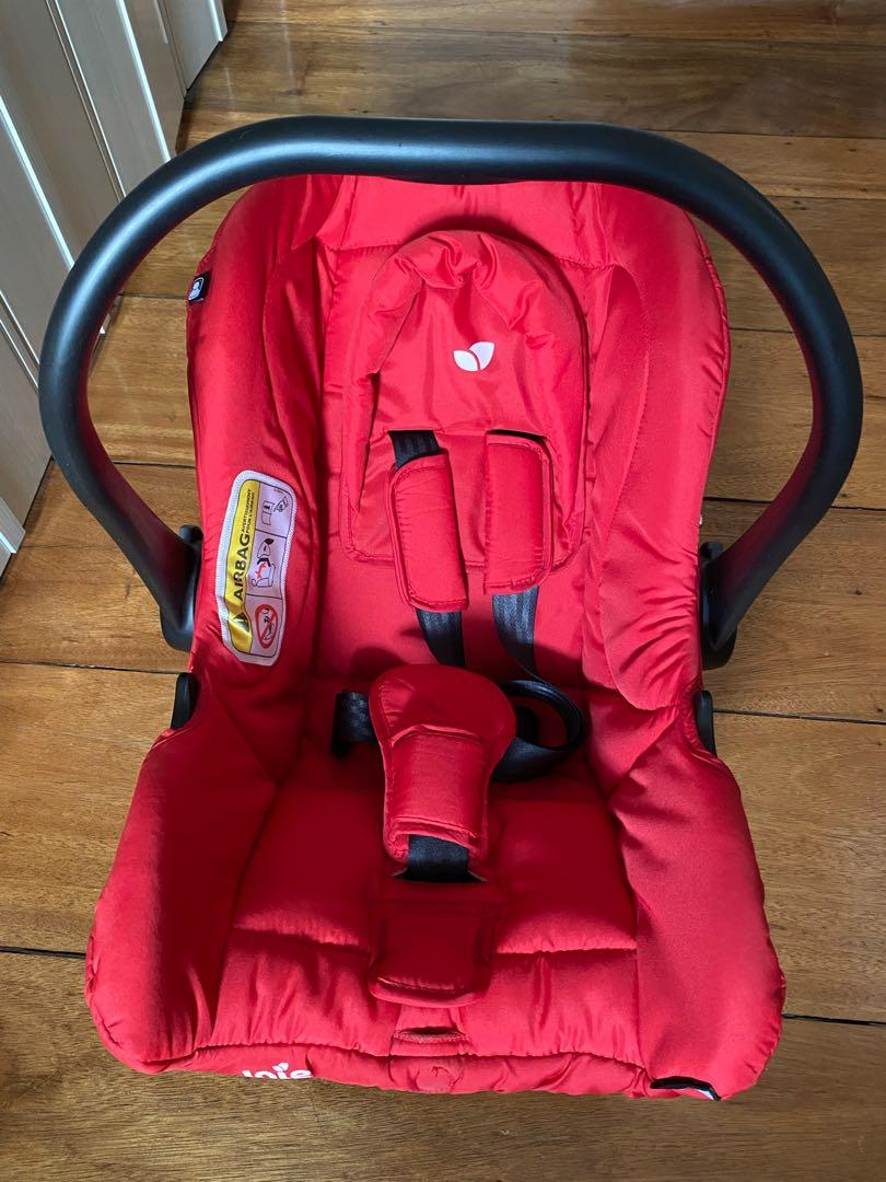 Joie Car Seat (Category: Car Seats) located in Pasig City. Submitted by an.rey (Listing ID 1099029967, Image 2). Description: With rain cover.