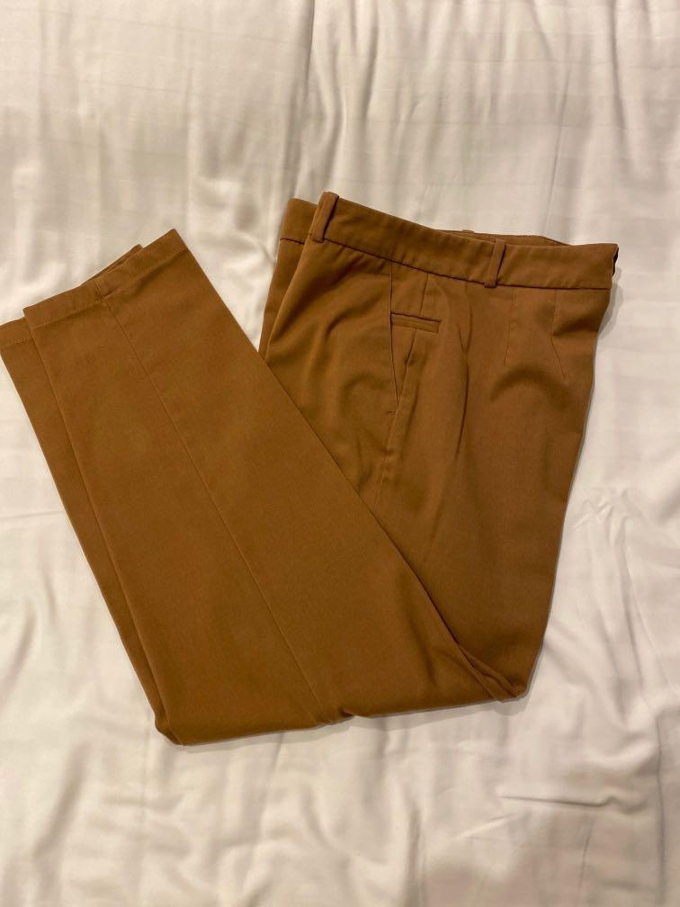 Mango Basics Slacks (Category: Other Bottoms) located in Cebu City. Submitted by vanmags (Listing ID 1099078656, Image 1). Description: Color: brown Good as new! No flaws! Great quality! Free tote bag for a total amount of 1.5k and above ❣️ Rfs: decluttering 3 days reservation only please!.