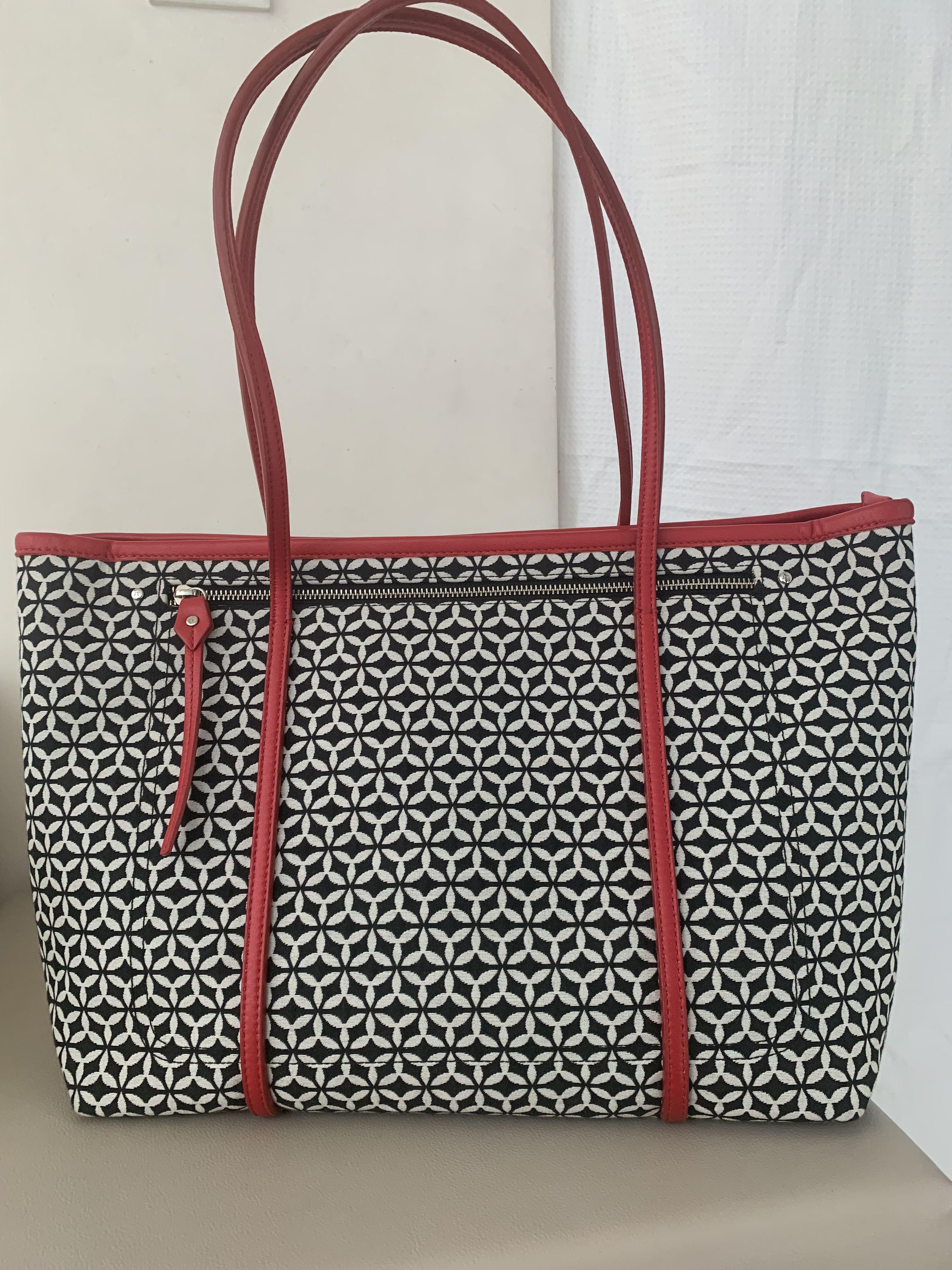 Jim Thompson tote and shoulder bag (Category: Tote Bags) located in Singapore. Submitted by emeralds (Listing ID 1099102135, Image 3). Description: Brand new bag from Jim Thompson premium range. Bought at $420. Quality finishing and comes with zippers. Lightweight with fine fabric and leather handles. .