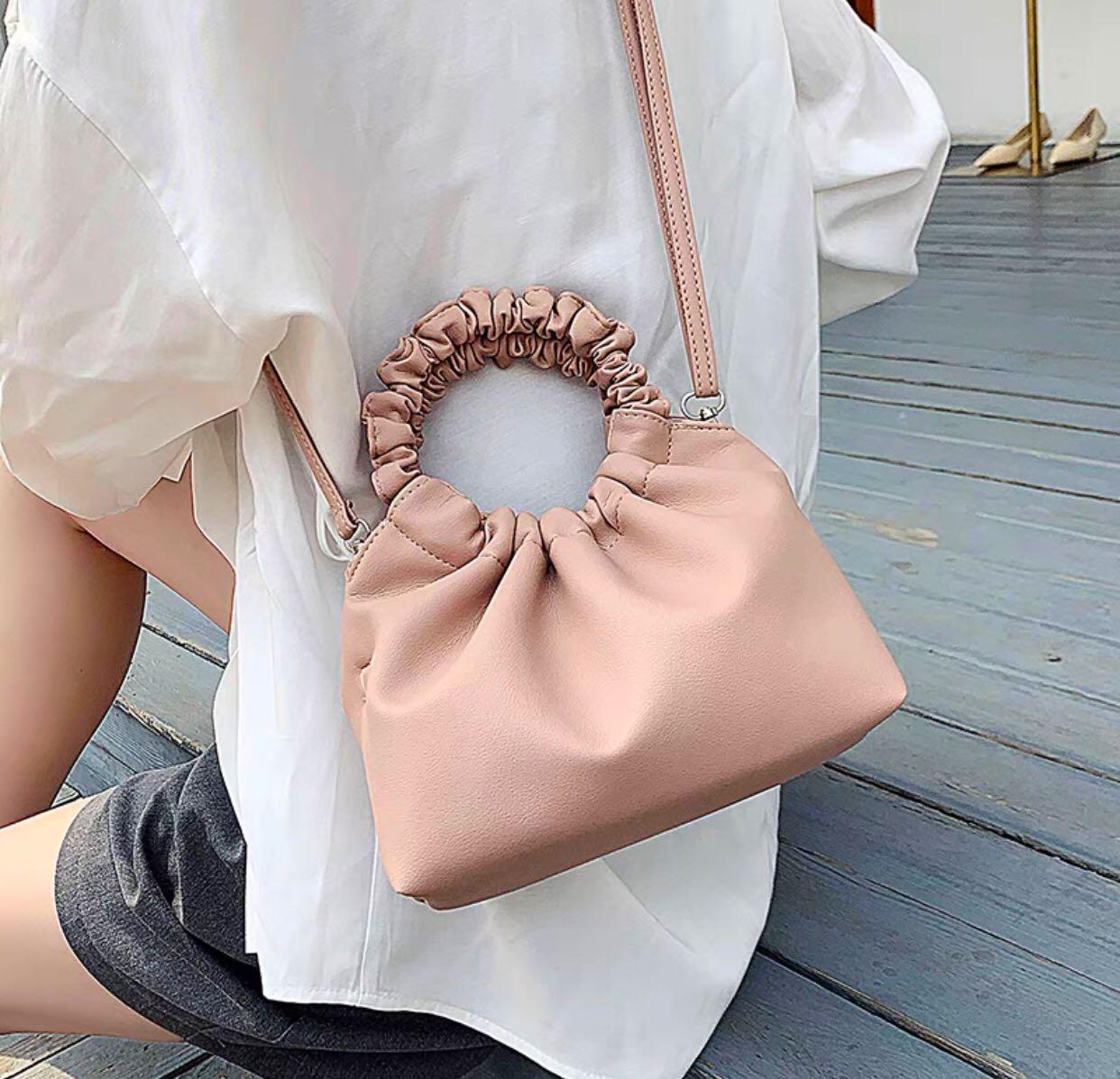 Mauve pink clutch bag top