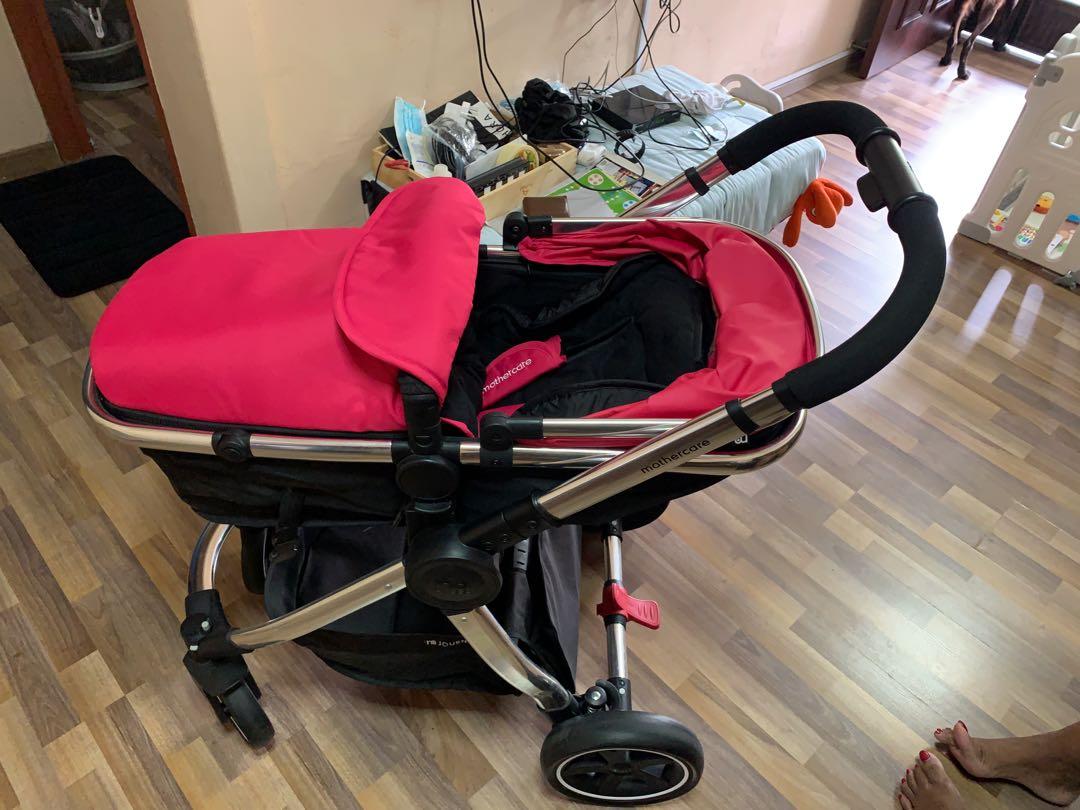 Pink mothercare travel system top