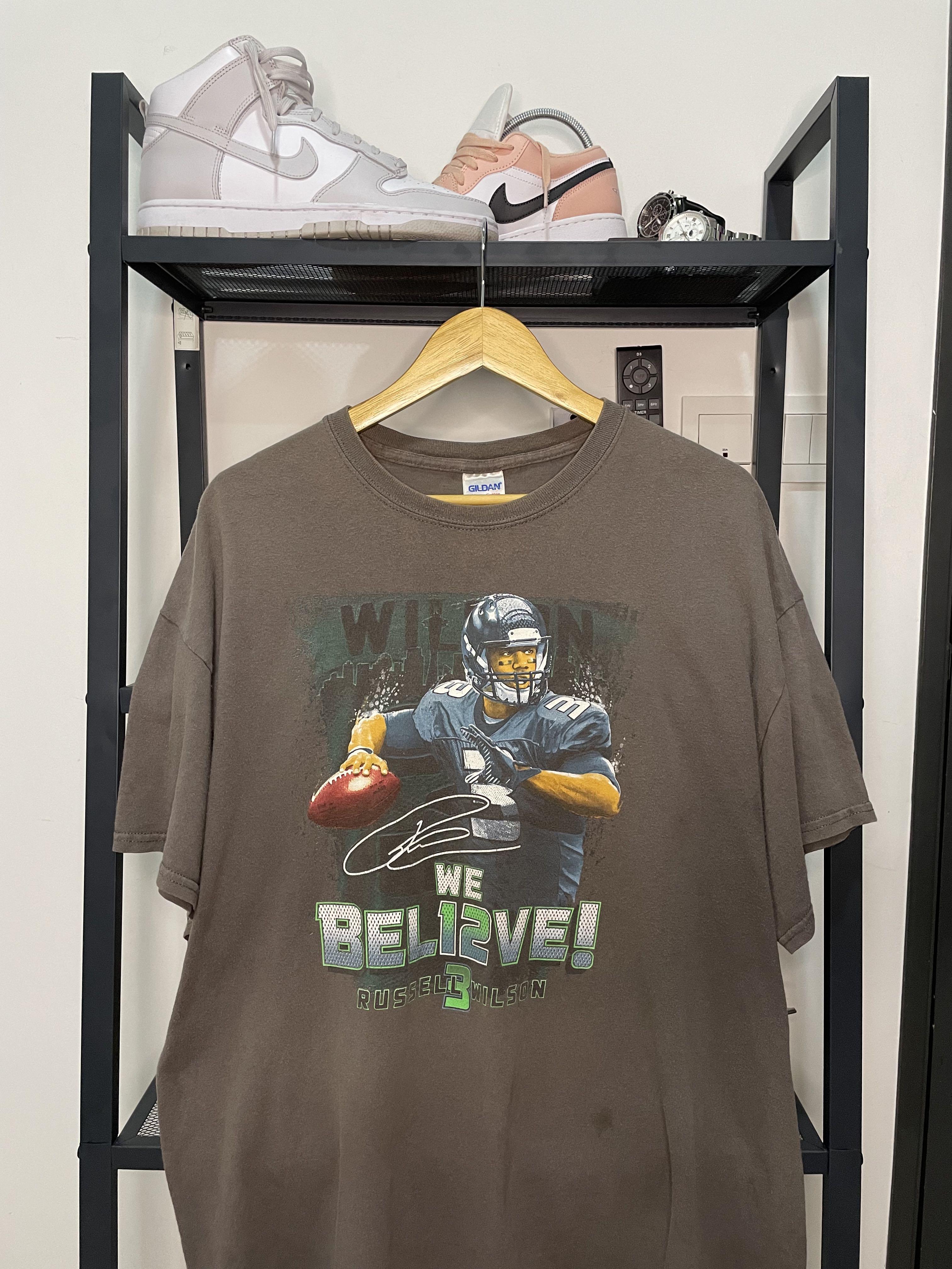 Russell Wilson Tee (Category: Tshirts & Polo Shirts) located in Johor Bahru. Submitted by thankgodd (Listing ID 1098716200, Image 1). Description: Russel Wilson WE BEL12VE GAME TEE Size XL Pit 23 Labuh 25 Condition 9/10 COD Shah Alam Can nego #MenTopXL #MenTopXL #MenTopXL.