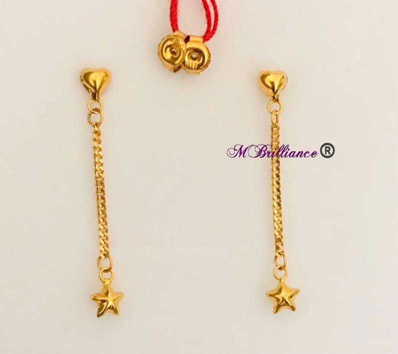 Dangling earrings gold top