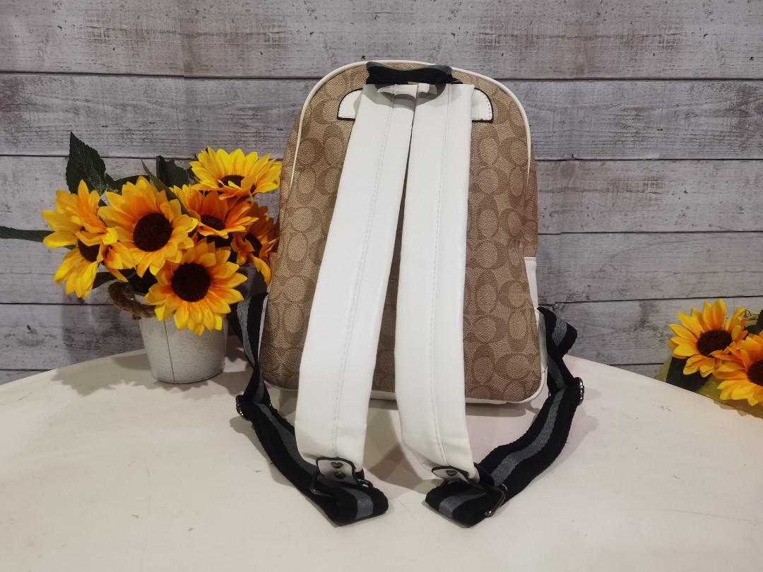 Vale medium charlie backpack in signature sales canvas with rexy by guang yu