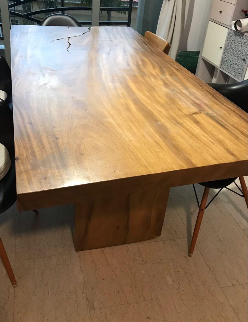 Solid wood dining table (Category: Tables & Sets) located in Singapore. Submitted by kitchenmaniac2 (Listing ID 1099644846, Image 2). Description: I bought this for $4000. Pickup only please. .