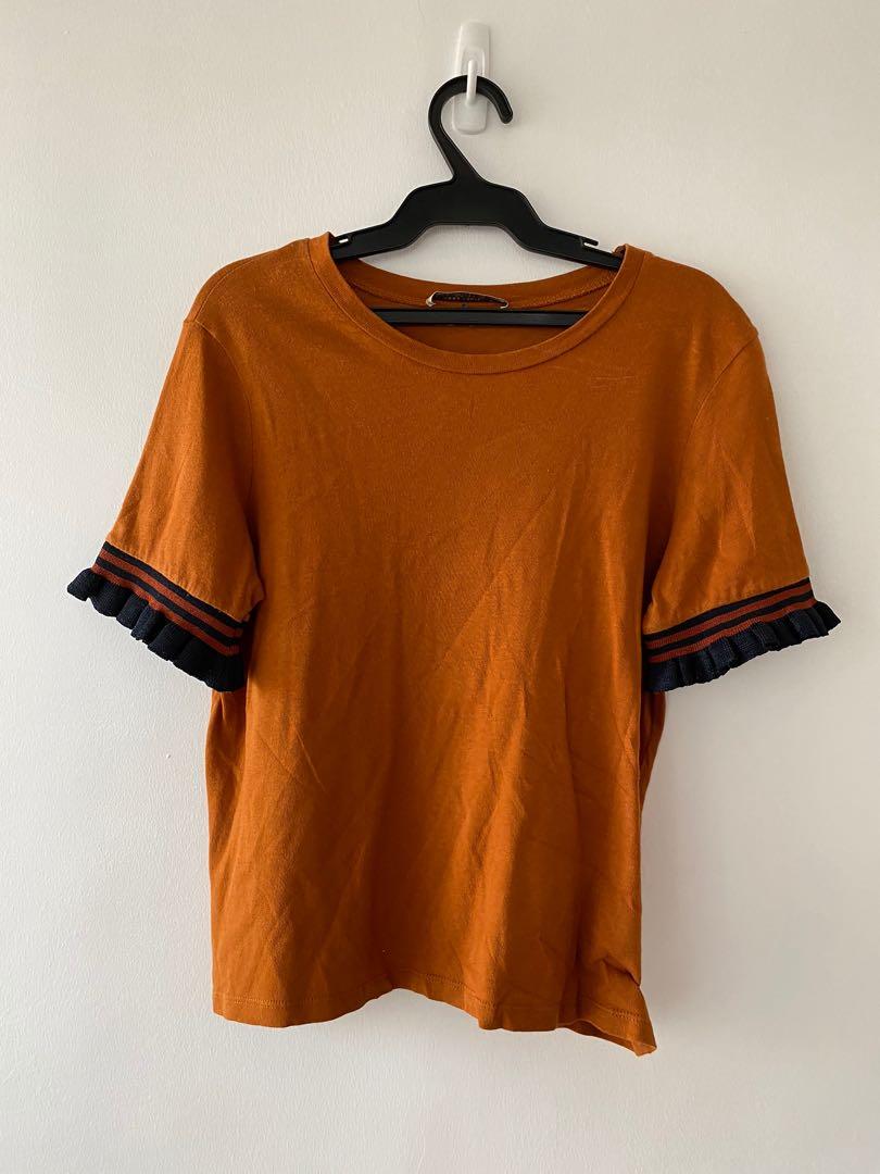 ZARA ruffled top (Category: Shirts) located in Quezon City. Submitted by fernan.declutter (Listing ID 1099574364, Image 1). Description: Best top I had and super easy to partner bottoms with it..
