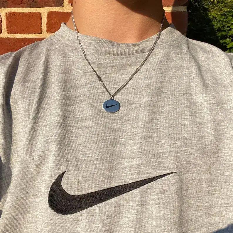 silver nike logo