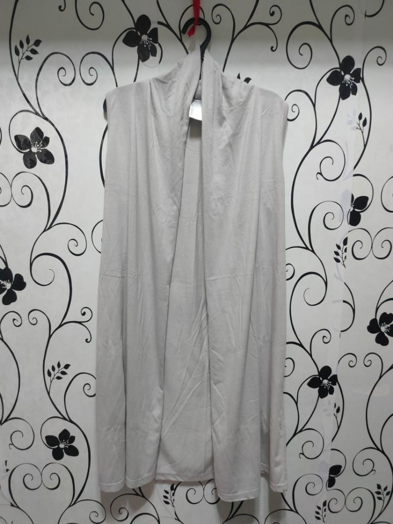 Gray sleeveless long cardigan (Category: Coats, Jackets and Outerwear) located in Quezon City. Submitted by _apparels_ (Listing ID 1104338622, Image 1). Description: Fits S to M body frame Length - 35 inches.