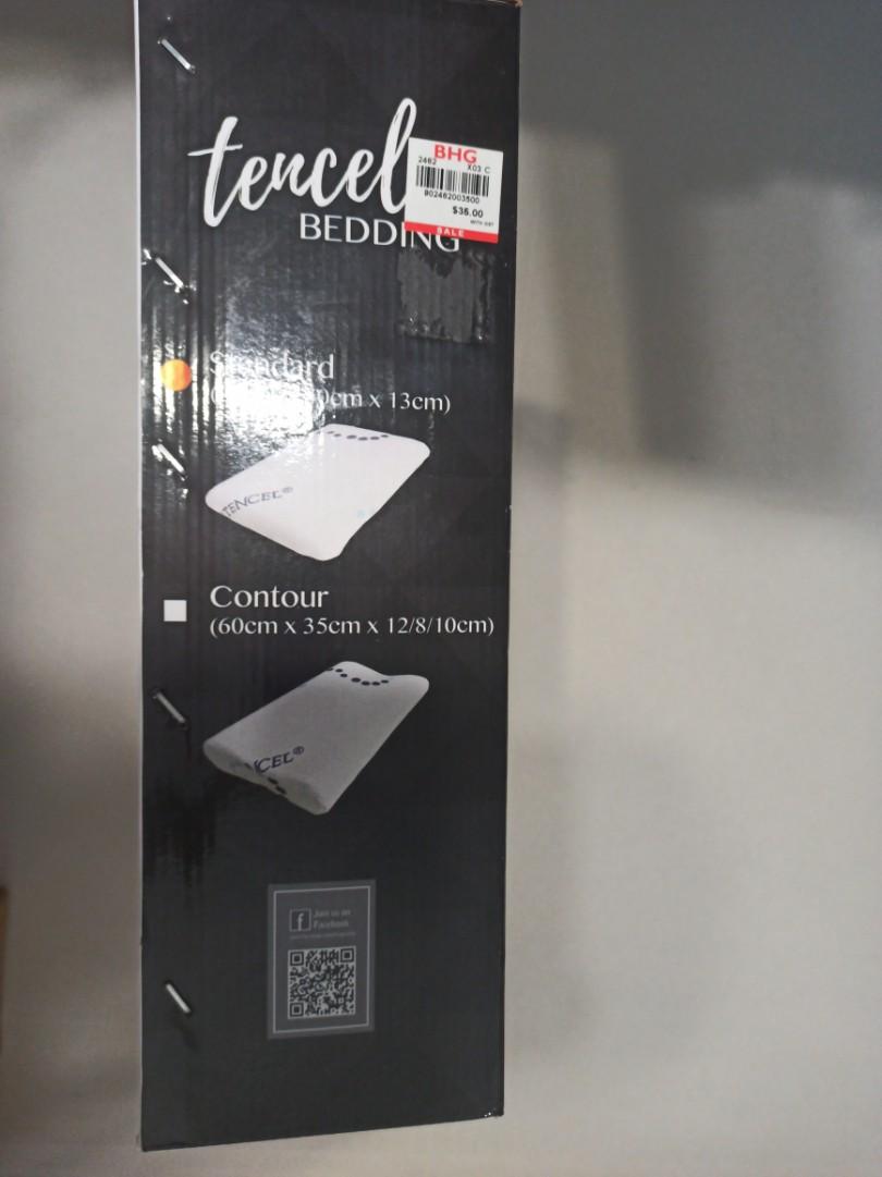 Tencel Bedding Memory Foam Pillow (Category: Bedding & Towels) located in Singapore. Submitted by joyt0210 (Listing ID 1104437568, Image 2). Description: item brand new, opened to check condition. Selling as bought too many. Selling at price of 1 for $30, both for $50. Both are memory foam pillow, one is standard pillow shaped, one is contour shaped as shown in the box picture provided..