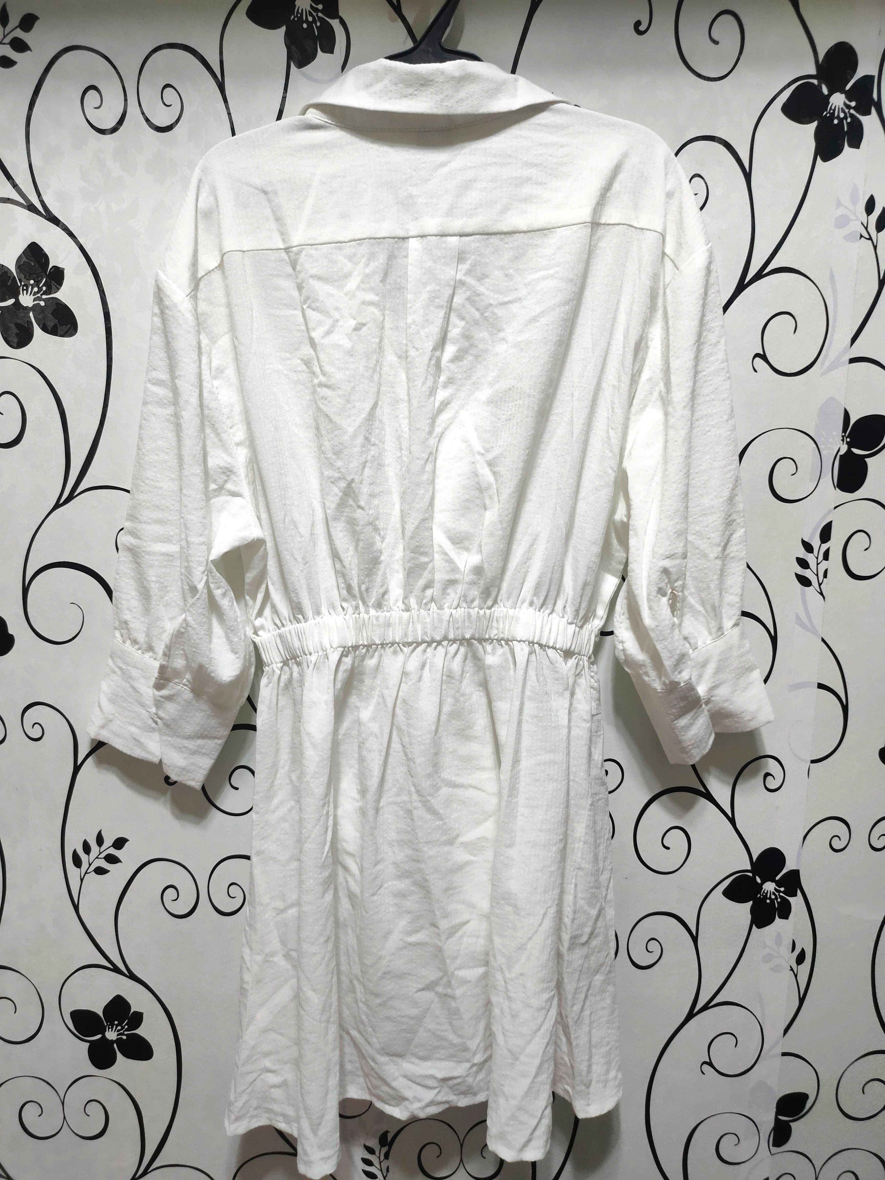 White collar long sleeve dress (Category: Dresses) located in Quezon City. Submitted by _apparels_ (Listing ID 1104334102, Image 2). Description: Length - 31 inches Fits S to M body frame Model's height is 5"3 for reference MOP - GCash or Security Bank QC area.