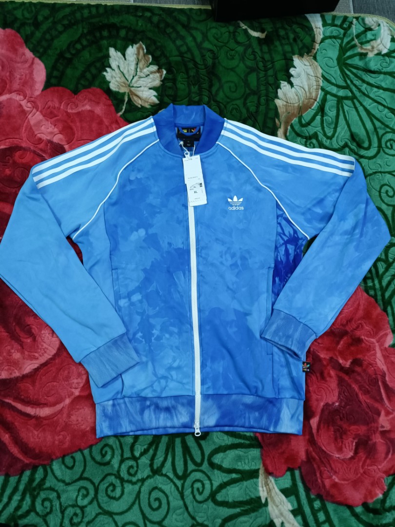 Adidas pharrell hotsell williams track top