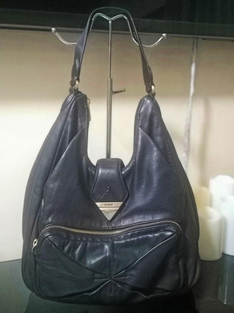 Botkier Hobo Shoulder Bag (Category: Shoulder Bags) located in Quezon City. Submitted by lamoure_demavie (Listing ID 1106326002, Image 3). Description: -preloved -authentic -medium -genuine buttery soft leather -signs of use -light scuff -not noticeable partial rough to touch rubs at the bottom back portion -partial rubber seal cracks -light hardware coat fading.