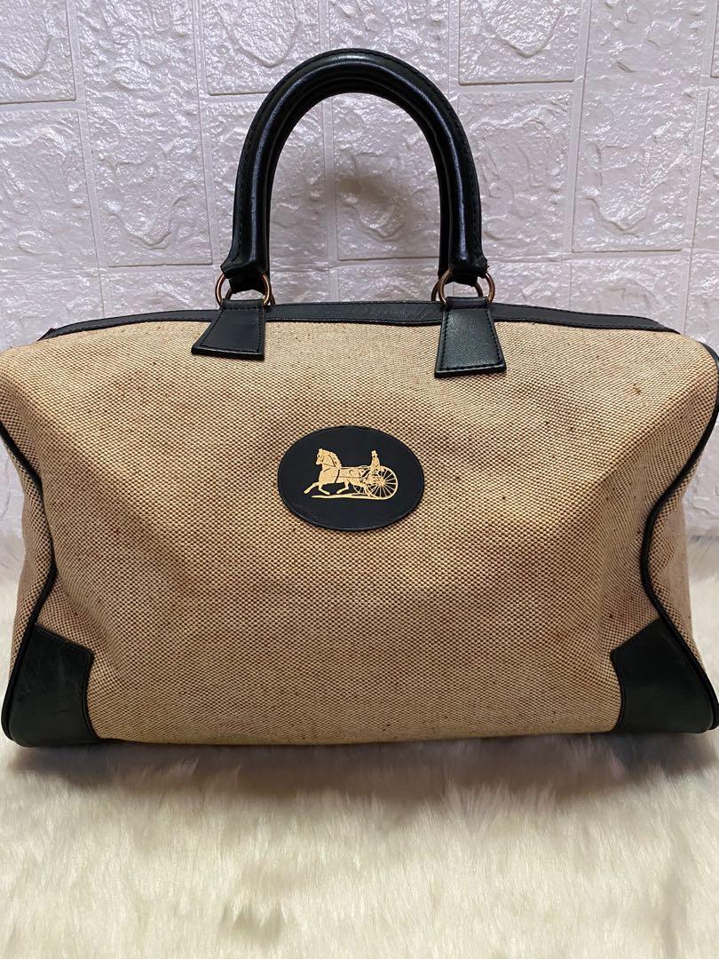 Authentic Celine Two tone Canvas Bag (Category: Luxury Bags & Wallets) located in Cagayan de Oro. Submitted by riggstuffs (Listing ID 1106363843, Image 1). Description: Preloved bag and guaranteed authentic Japan source Material is made of light beige canvas with leather trimming at each corner The Exterior area is in very good condition The hardware is a bit tarnished due to it being a vintage bag The Interior is very clean, the material is made