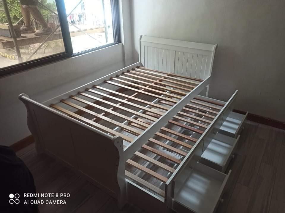 Double bed with pull out and drawers (Category: Bed Frames & Mattresses) located in Pasay City. Submitted by cherry_nicole (Listing ID 1106347590, Image 3). Description: 20,000 20,000 double size bed frame 48x75 with single pull out 36x75 and 3 drawers solid wood ‼️‼️ WAREHOUSE PRICE ‼️‼️ 💯 BRAND NEW ITEMS 💯 ✅ Imported items ✅ MALAYSIAN SOLID RUBBER wood ✅ Free delivery and assemble with in metro manila ✅ Plus delivery charge in CAVITE , BULACA