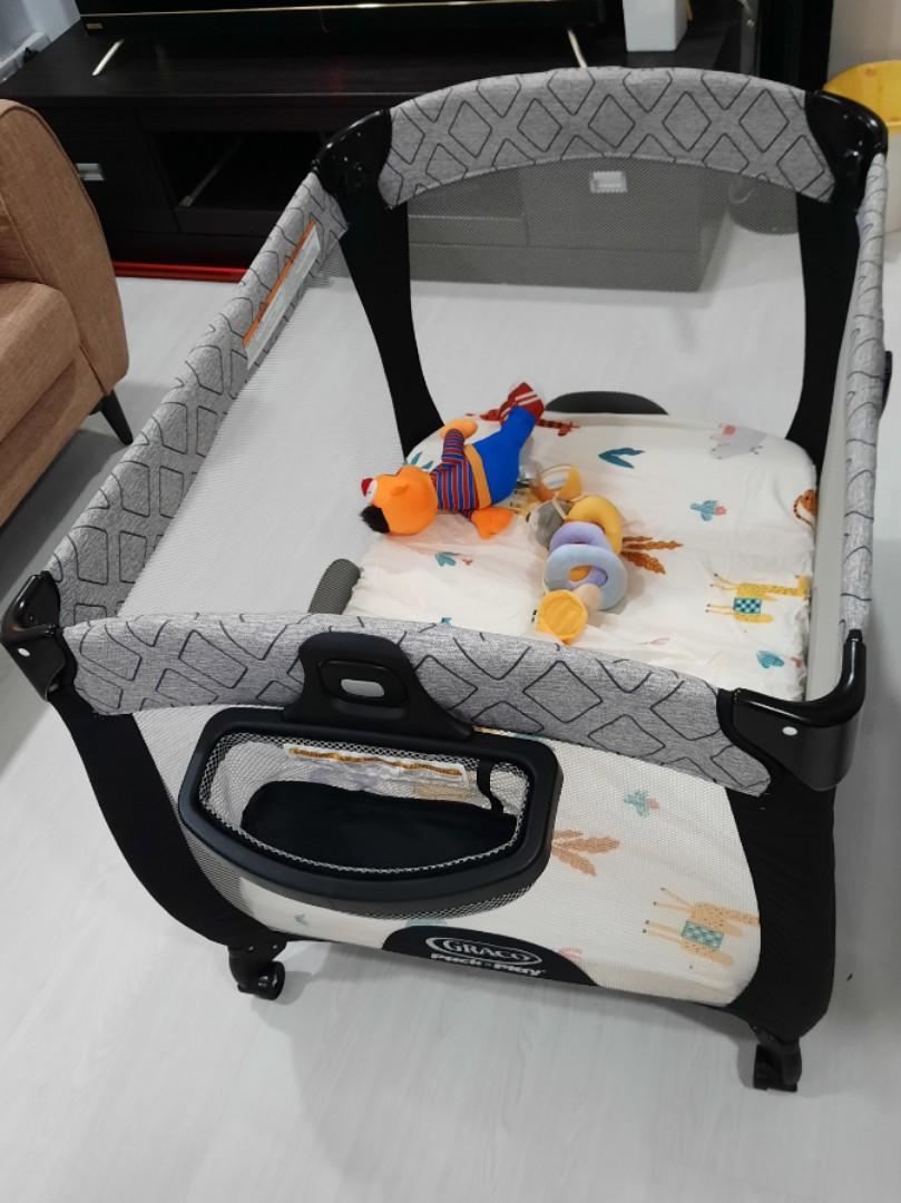 Graco pack and play asher top