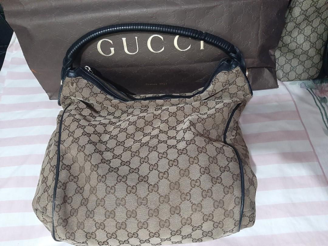 GUCCI BAG (Category: Luxury Bags & Wallets) located in Quezon City. Submitted by sassy1816 (Listing ID 1106256613, Image 1). Description: Original Gucci Bag With Paper bag with code 323668.