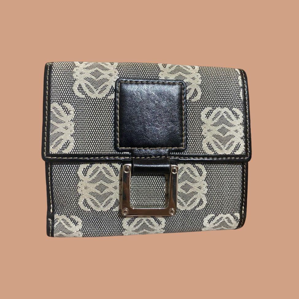 LOEWE MONOGRAM CANVAS SMALL BIFOLD WALLET (Category: Luxury Bags & Wallets) located in Quezon City. Submitted by najamazing (Listing ID 1106299451, Image 1). Description: LOEWE MONOGRAM CANVAS SMALL BIFOLD WALLET Material: Monogram Canvas with Leather Lining.