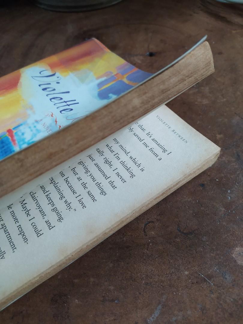 Preloved book: Violette Between - Alison Strobel (Category: Storybooks) located in Muntinlupa City. Submitted by elle_declutter (Listing ID 1106389393, Image 2). Description: - No written annotations - Stains around the edges (which are normal sa books) - Some water stains at the last few pages (message me for more photos).