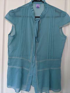 SOS teal coloured top