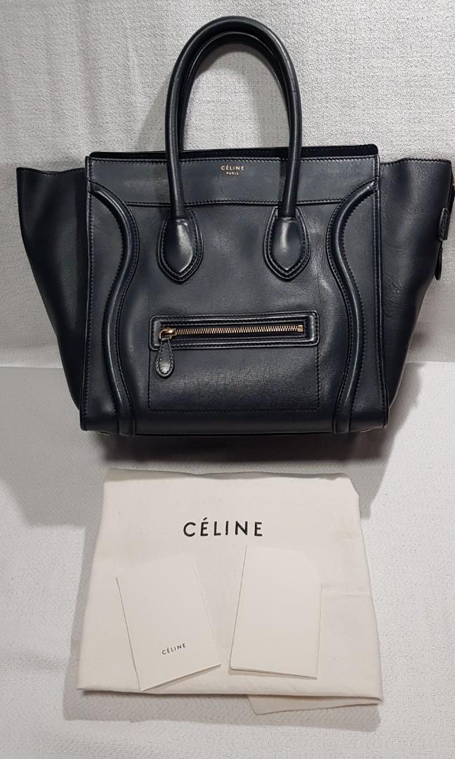 Authentic Celine Mini Luggage Bag (Category: Luxury Bags & Wallets) located in Manila. Submitted by jmgco (Listing ID 1106435058, Image 1). Description: Celine Mini luggage Authentic 12.5"H x 7.5"W x 11"D Gold hardware Navy color Smooth leather Made in italy Serial S-VP-1111 Comes dustbag and card Good used condition, has some scuff due to normal use as shown on pic Pre-owned RFS: not using anymore Meet up: grace park caloocan Cash upon meet up /