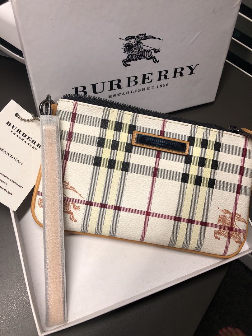 Burberry wristlet, Women's Fashion, Bags & Wallets, Purses & Pouches on  Carousell