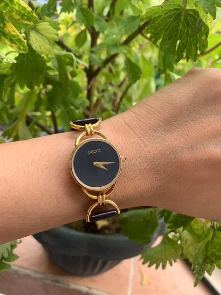 Gucci gold on sale watch black face