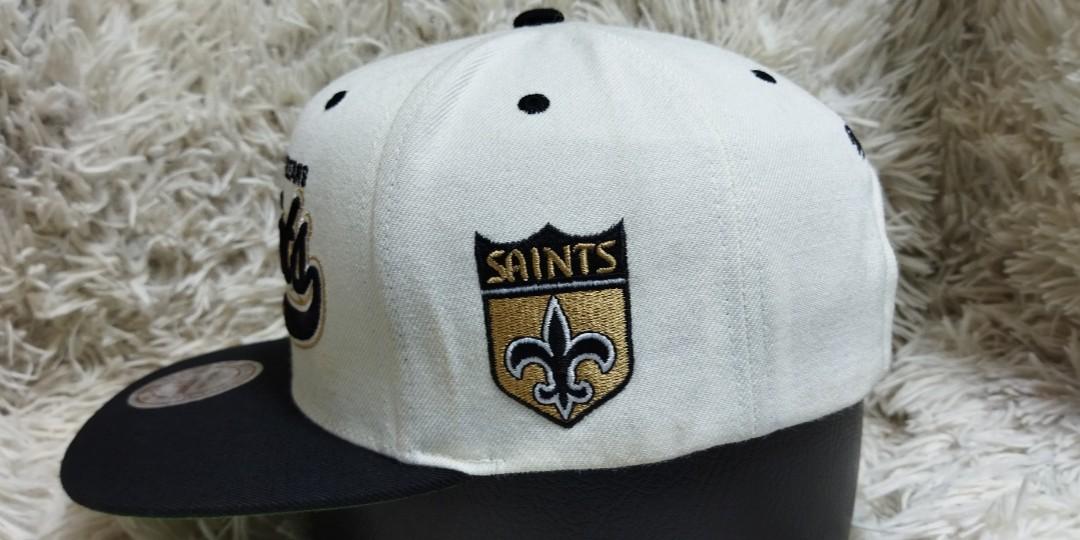 New Orleans Saints Snapback Cap by Mitchell and Ness, Men's Fashion,  Watches & Accessories, Caps & Hats on Carousell