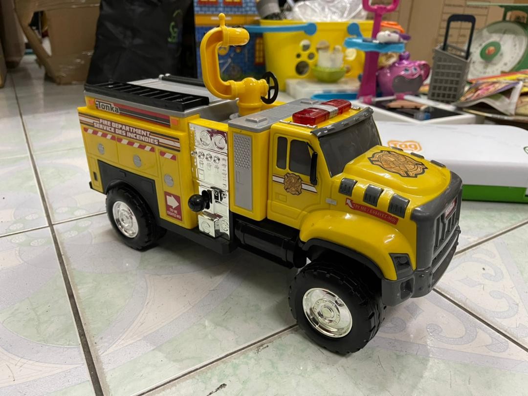 Yellow toy fire truck on sale