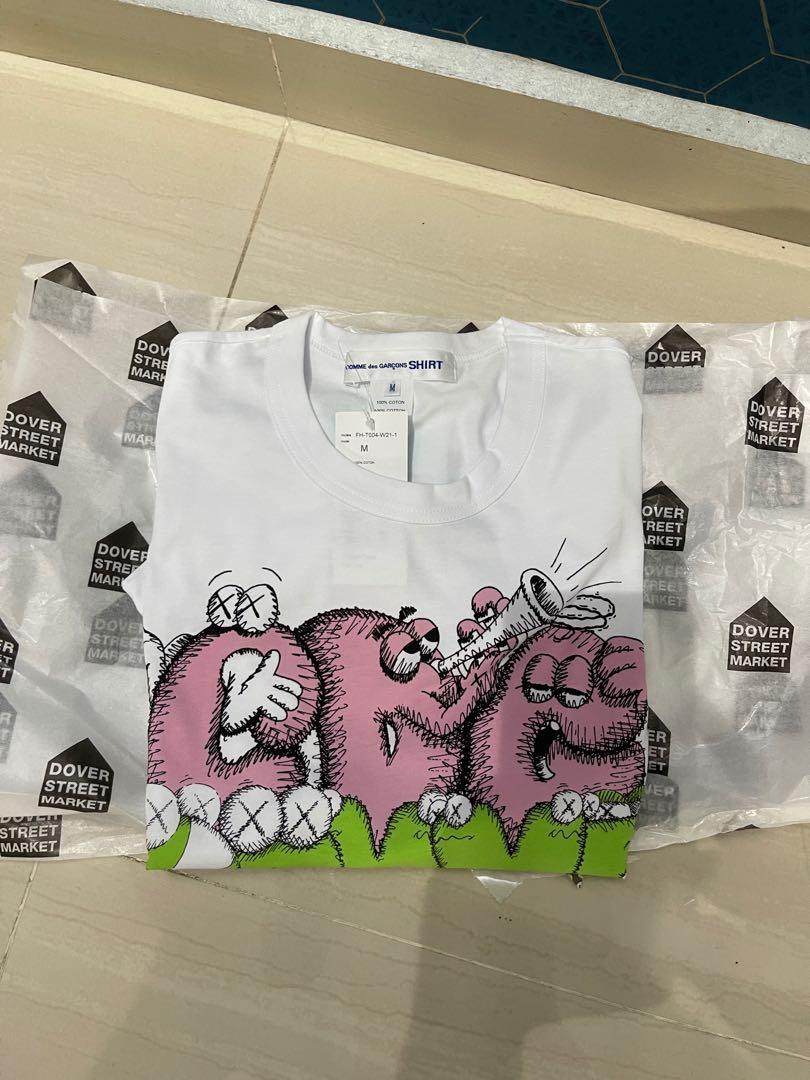 WTS WTT Comme des Garcon CDG shirt x Kaws T004 pink Men s Fashion Tops Sets Tshirts Polo Shirts on Carousell