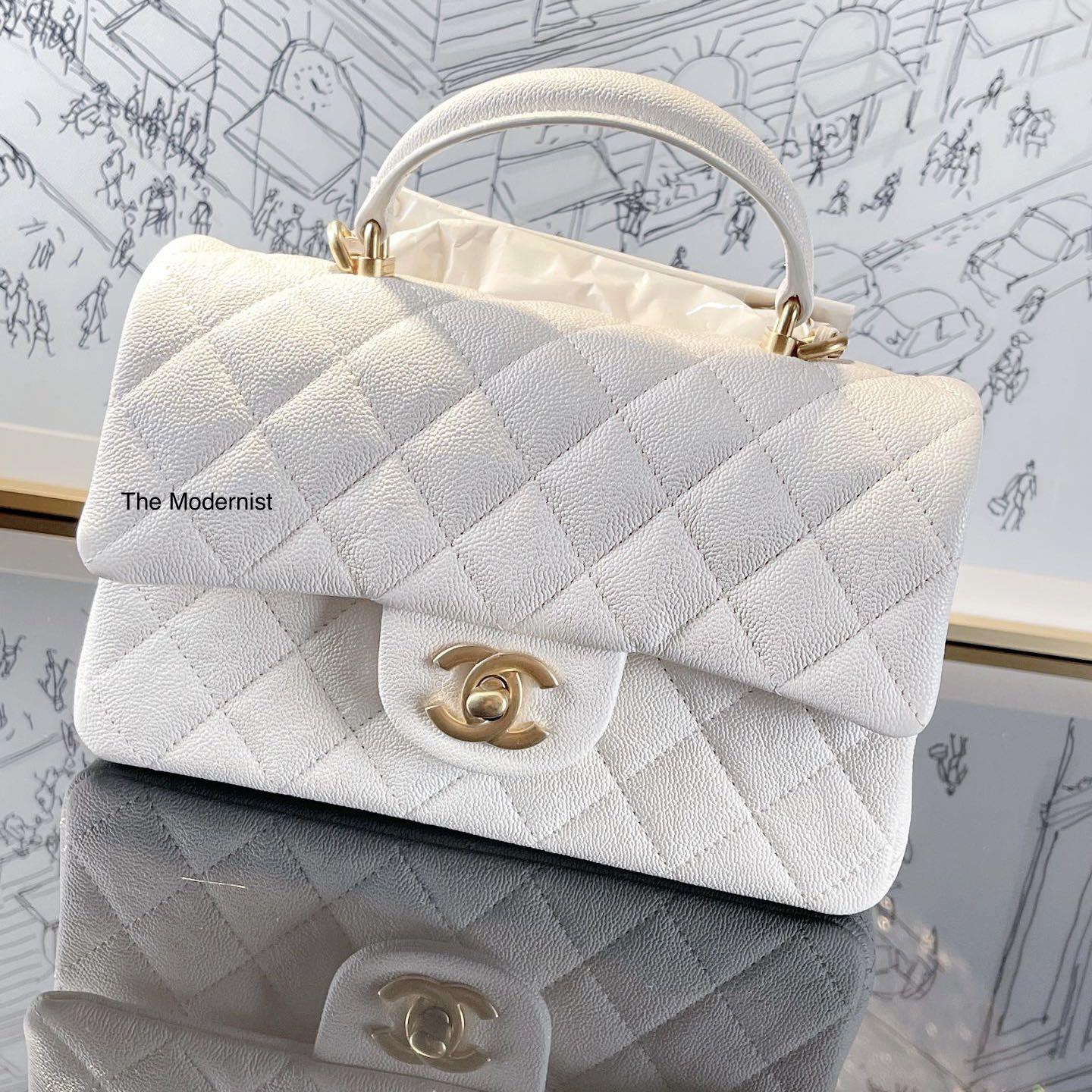 Authentic Chanel Mini Rectangular With Top Handle White Caviar Gold Hardware