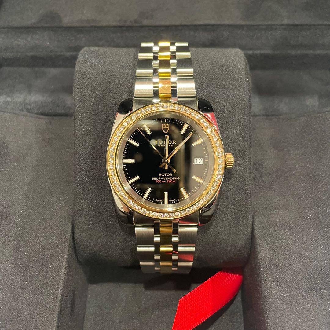 BNIB Tudor Classic Date M21023-0001 (Category: Watches) located in Singapore. Submitted by tlsgoods (Listing ID 1106792448, Image 1). Description: Brand New Unworn 100% Authentic. Local AD. Original Box w Warranty Card & Booklets 5 Years Warranty w Tudor RTP: $9072 Special Features: Contains 60 Diamonds Model: M21023-0001 Case: 38mm Stainless Steel, Yellow Gold Dial: Black, Lacquered Crystal: Sapphire Crystal Bracelet: Stainless Steel, Yellow Gol