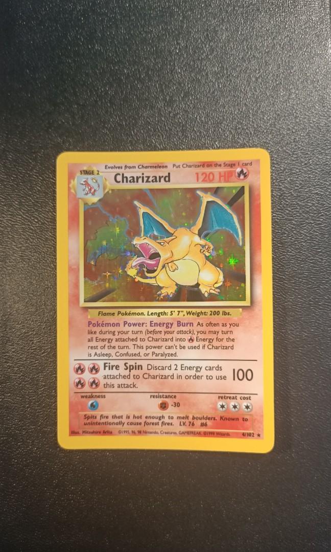 charizard pokemon card unlimited PSA 7 NM main image 1