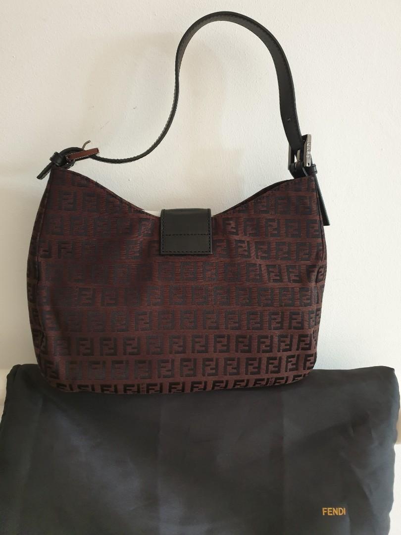 Fendi FF Zucca Monogram Baguette Shoulder Bag (Category: Luxury Bags & Wallets) located in Davao. Submitted by declutter14 (Listing ID 1106648017, Image 2). Description: Vintage Rare Authentic Fendi Ff brown bag with dustbag Condition 9/10 Free Shipping SG TO PH 35,500 Bawal barat dito,.