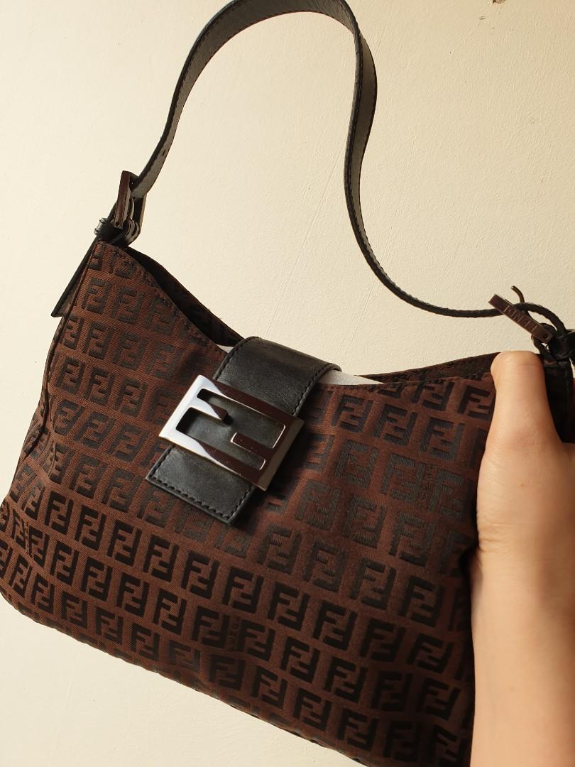 Fendi FF Zucca Monogram Baguette Shoulder Bag (Category: Luxury Bags & Wallets) located in Davao. Submitted by declutter14 (Listing ID 1106648017, Image 3). Description: Vintage Rare Authentic Fendi Ff brown bag with dustbag Condition 9/10 Free Shipping SG TO PH 35,500 Bawal barat dito,.