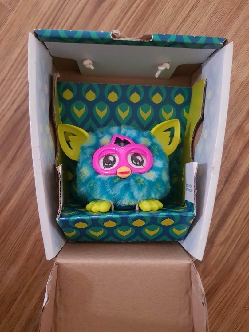 Furby Furblings (Category: Interactive Toys) located in San Fernando. Submitted by authenticsph (Listing ID 1106618057, Image 3). Description: Preloved Furby Furblings Used 2x, but because it was stocked, di na gumagana ung sa battery. Selling Low⬇️⬇️⬇️ Fixed Price Posted, pls no haggling. Thank you. 🥰.