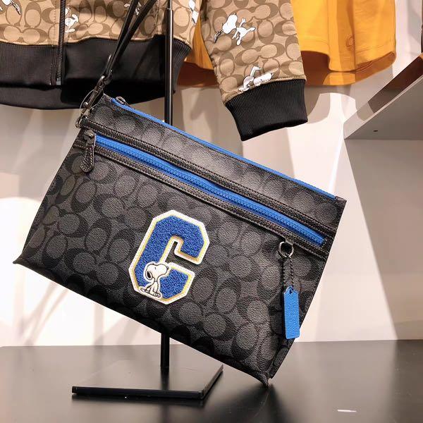 Coach carryall pouch in signature canvas deals