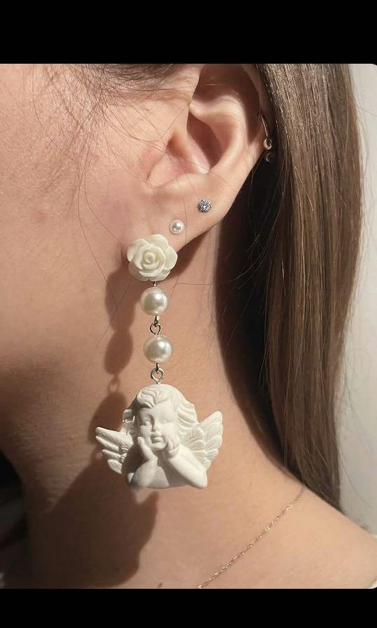 Cherub earrings sales