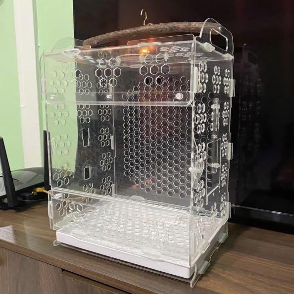 Acrylic Bird Cage - Lovebird, Budgie, Conures, Parrotlets (Category: Homes & Other Pet Accessories) located in Singapore. Submitted by wild.frostt (Listing ID 1106954198, Image 1). Description: Measurement Length : 25CM Height : 35CM Dept : 20CM INCLUSIVE • Feeder Box • Perch • Water feeder Information • First two picture are sample • Brand new stocks items •Item are dismantled and need to be fixed.