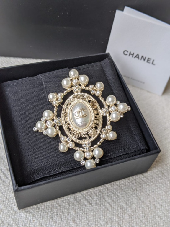 Chanel pearl discount brooch price