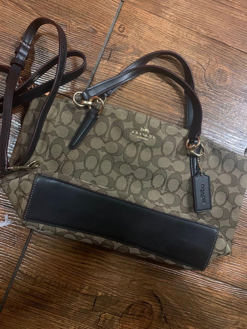 Authentic Coach Monogram 2 way bag (Category: Luxury Bags & Wallets) located in Cainta. Submitted by summerda (Listing ID 1106980681, Image 1). Description: Coach Monogram handbag with long strap. Brand new and never been used. Original price: $275 RFS: Decluttering.