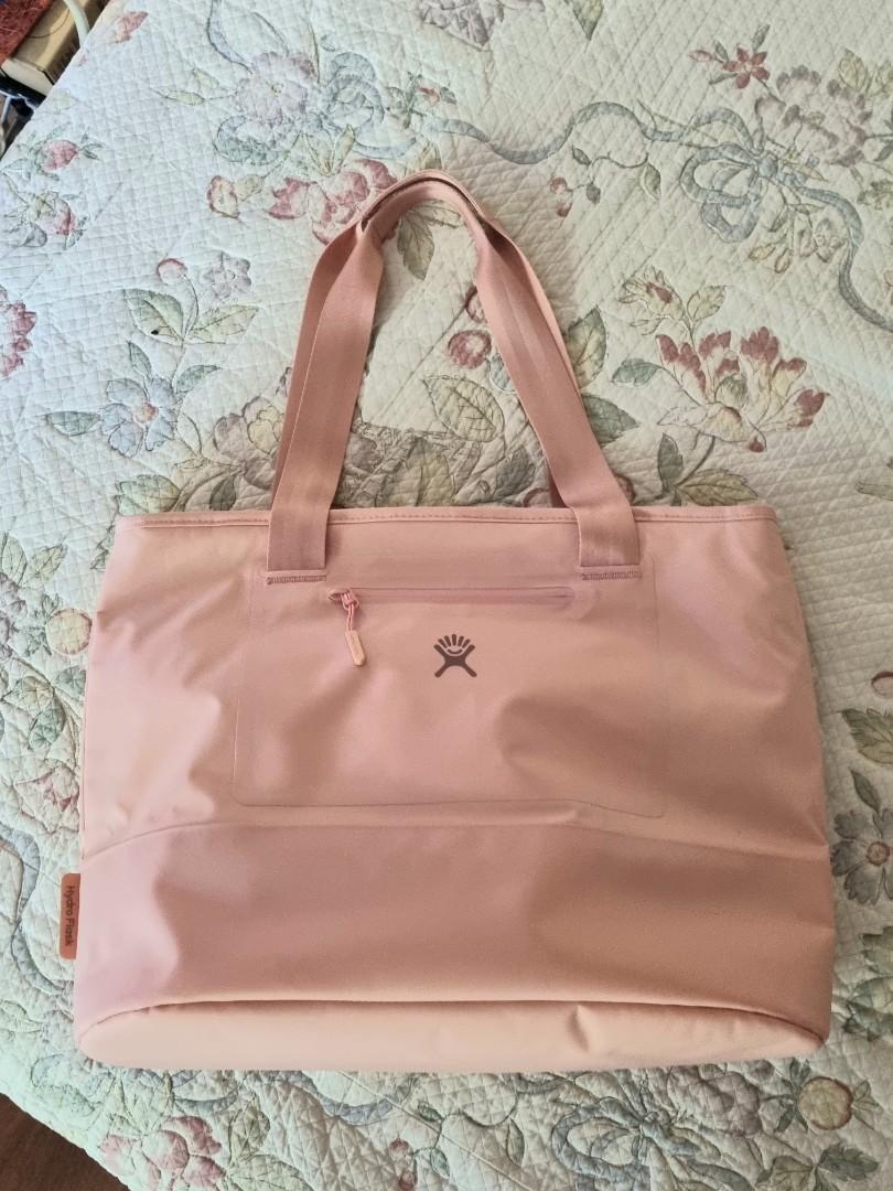 Hydroflask 20L Insulated Tote (Category: Maternity Care) located in Makati City. Submitted by AnnaK (Listing ID 1106872093, Image 1). Description: Twice used, lightweight insulated tote perfect for grocery runs, weekend outings or all-around carry-on bag to keep food and drinks. Can be a baby bag to store milk or baby food. Coated, waterproof fabric and very durable. Collapsible for quick storage and travel. 🛍⛱🥑🧊🥤🧋 RFS : Too big.