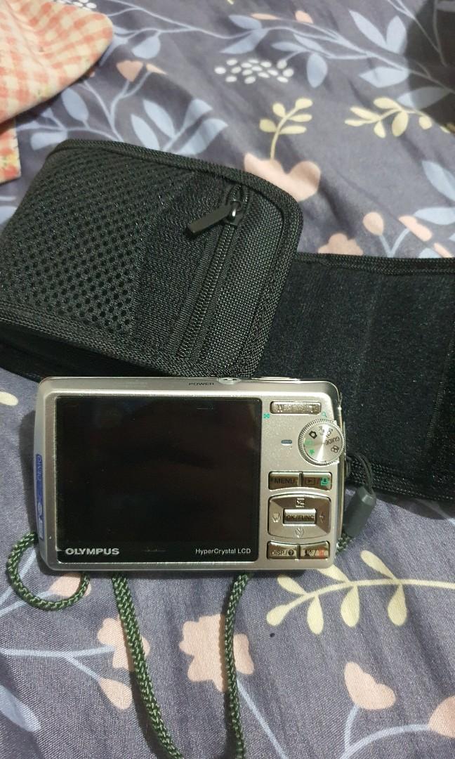 Olympus camera (Category: Cameras) located in Singapore. Submitted by everythingprettybys (Listing ID 1106985533, Image 2). Description: no charger, long time didn't use so not sure if it's working.selling as is.maybe suitable for collector.im not sure.well kept in its cover..
