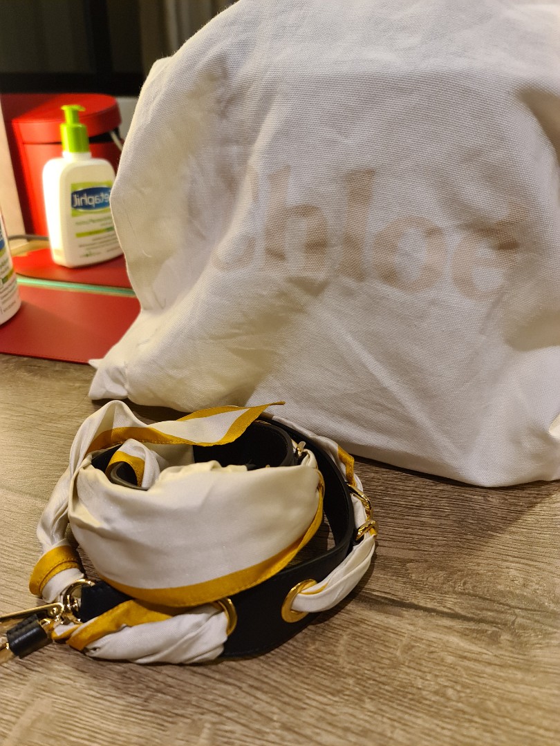 Chloe roy bucket bag white top