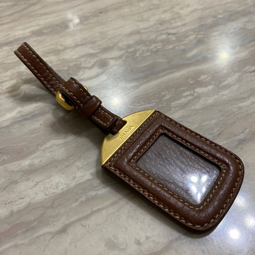 prada bag tag